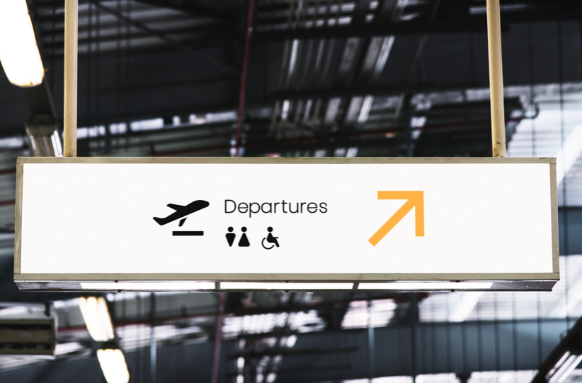 機場大廳牌子寫上出境的英文單字